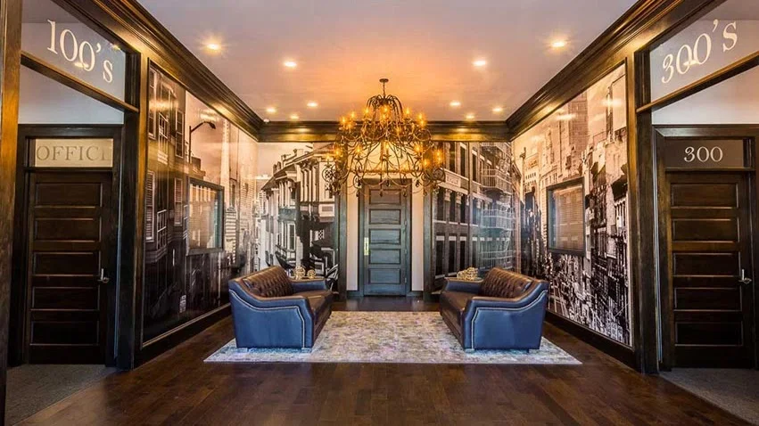 City Salon Suites & Spa exterior in Plano, Texas, featuring a stone facade, large windows, and a welcoming entrance, emphasizing advanced med spa services for skin rejuvenation and body contouring.