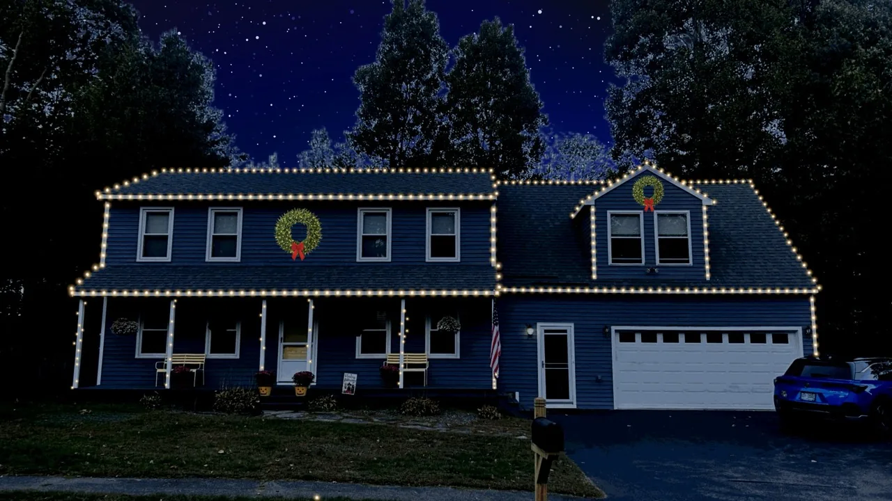 Christmas light design visualization for a blue colonial home
