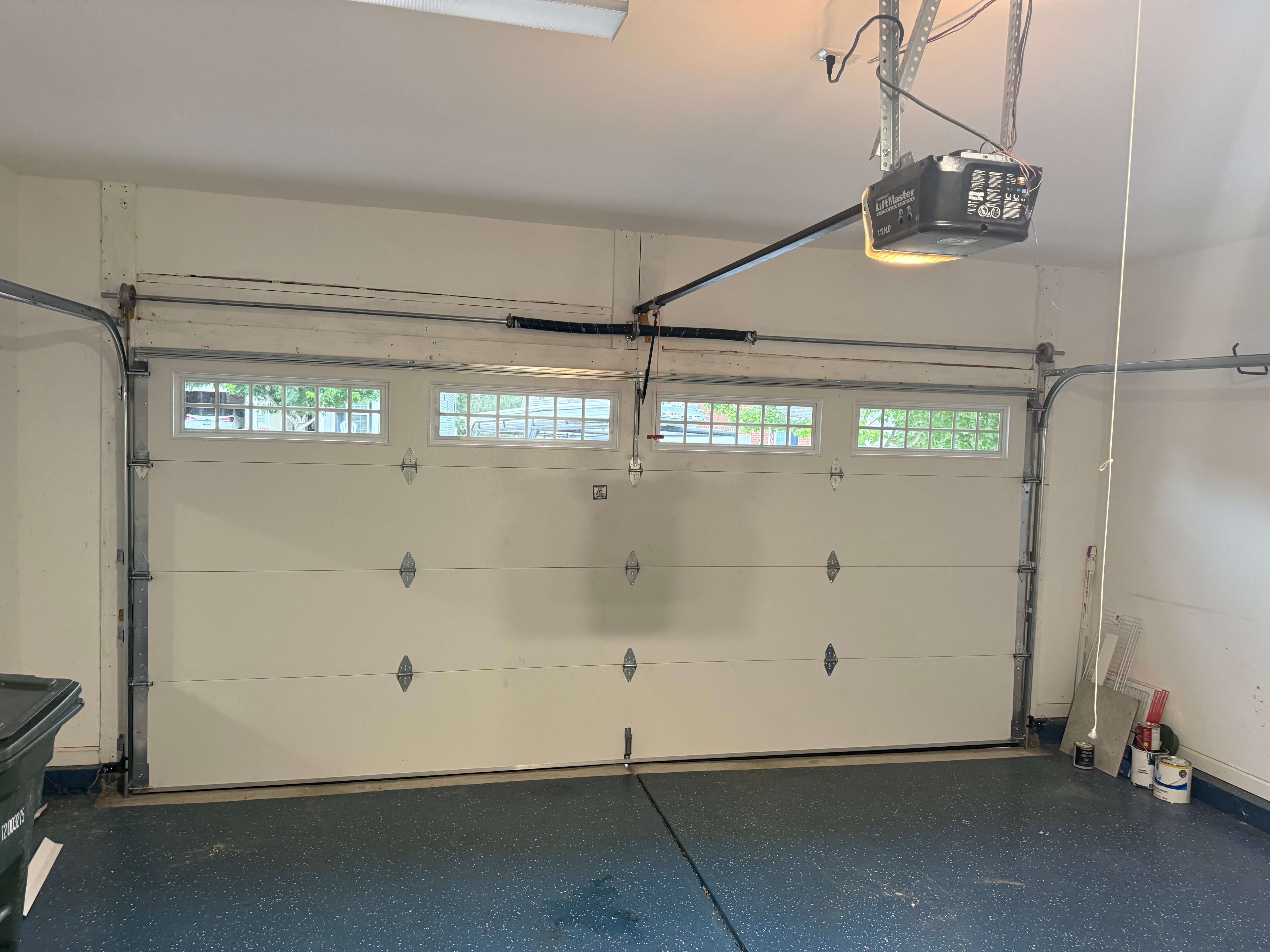 Modern full view glass garage door installation in Monroe NC