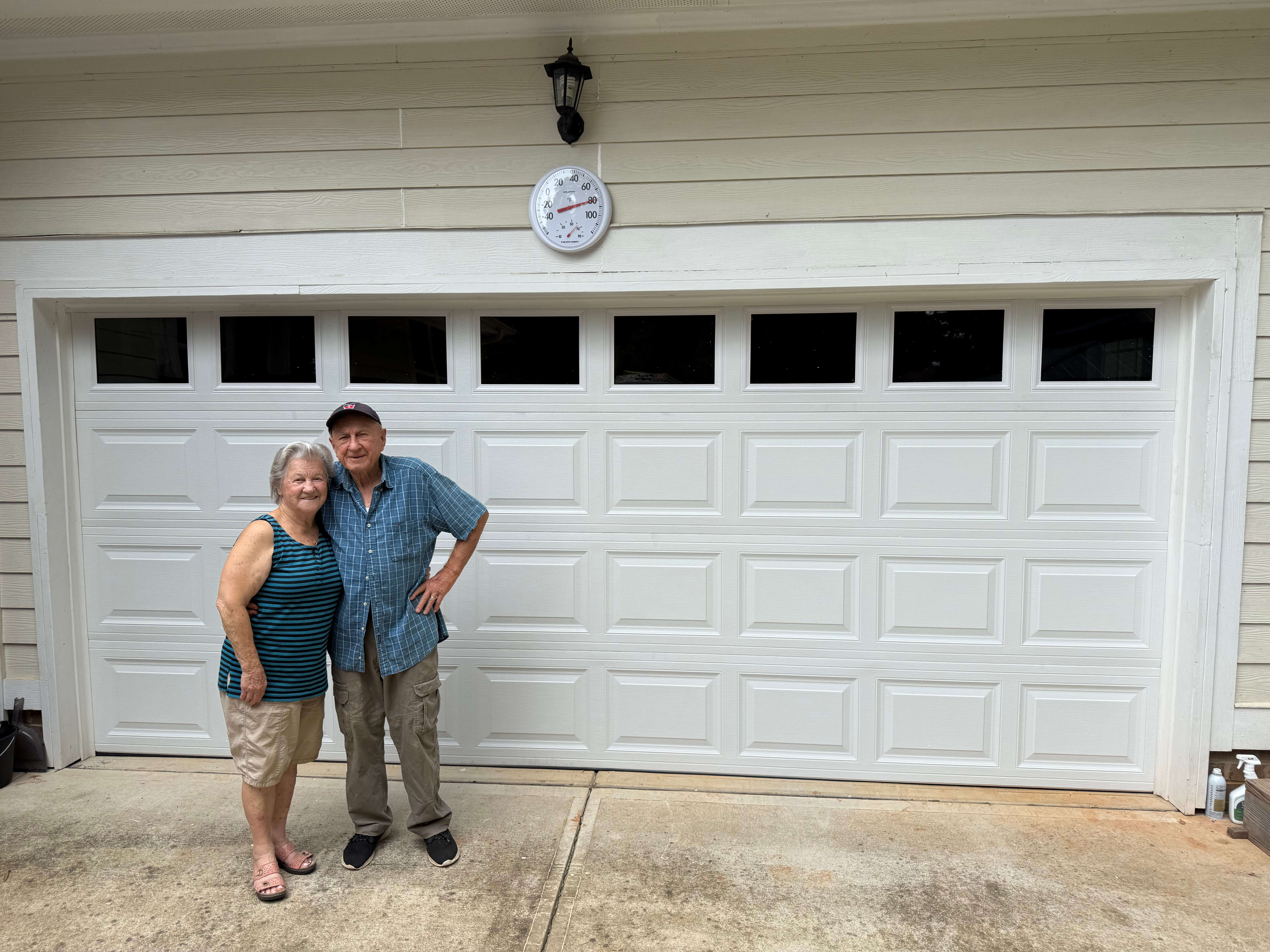 Double car garage door replacement with windows in Charlotte NC