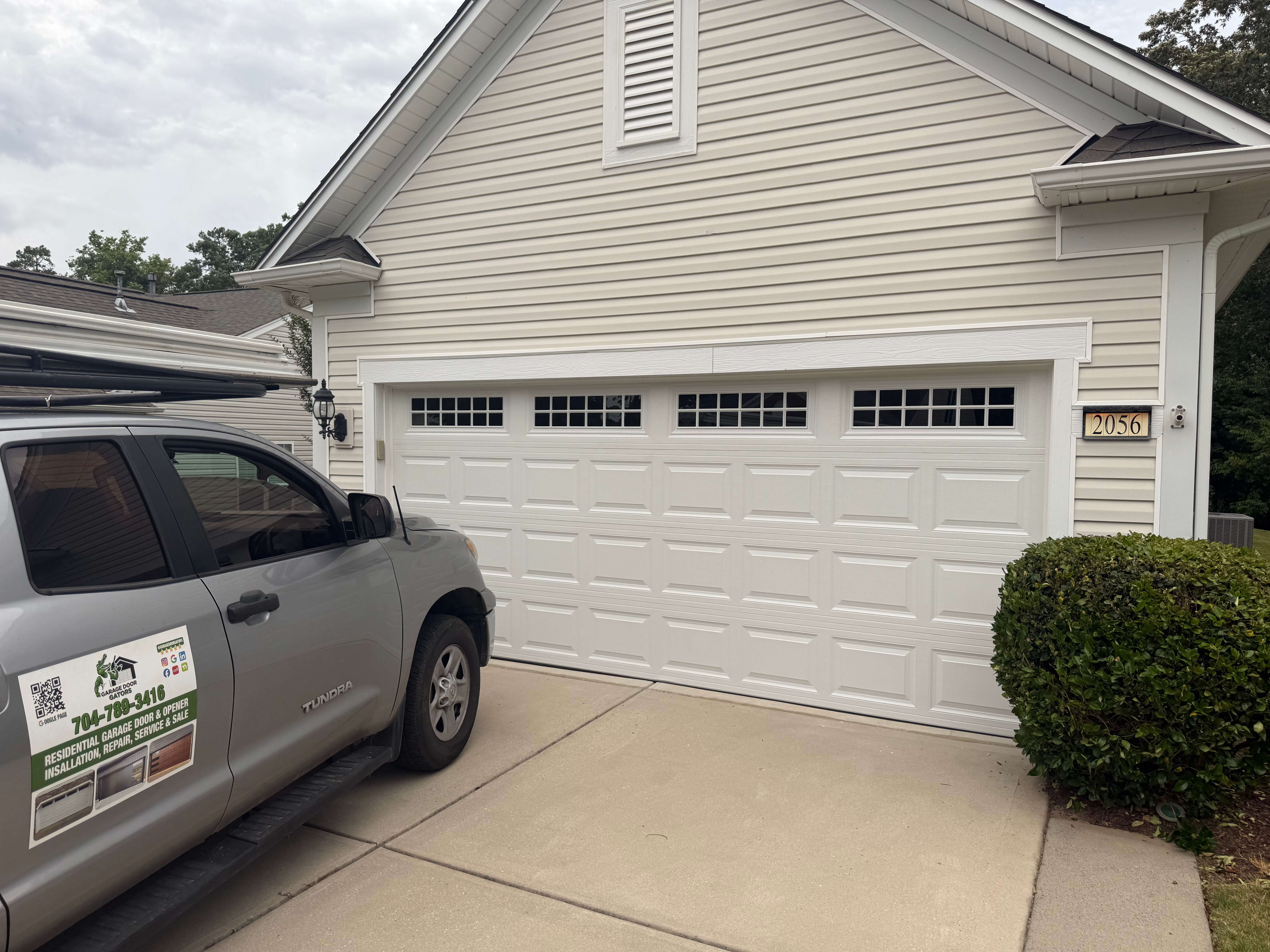 Custom wood look garage door replacement in Matthews NC