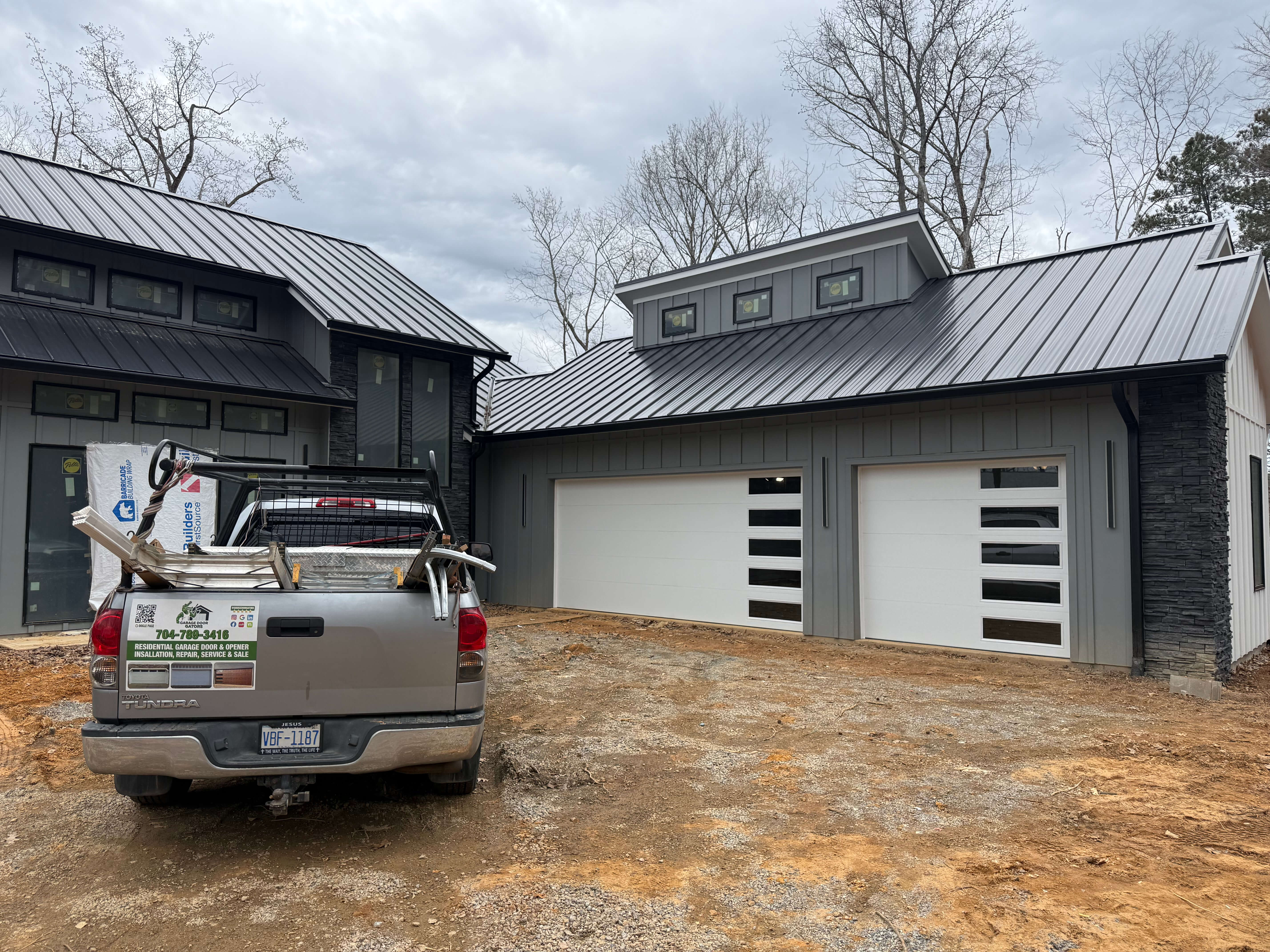 Extension spring replacement on residential garage door in Concord NC