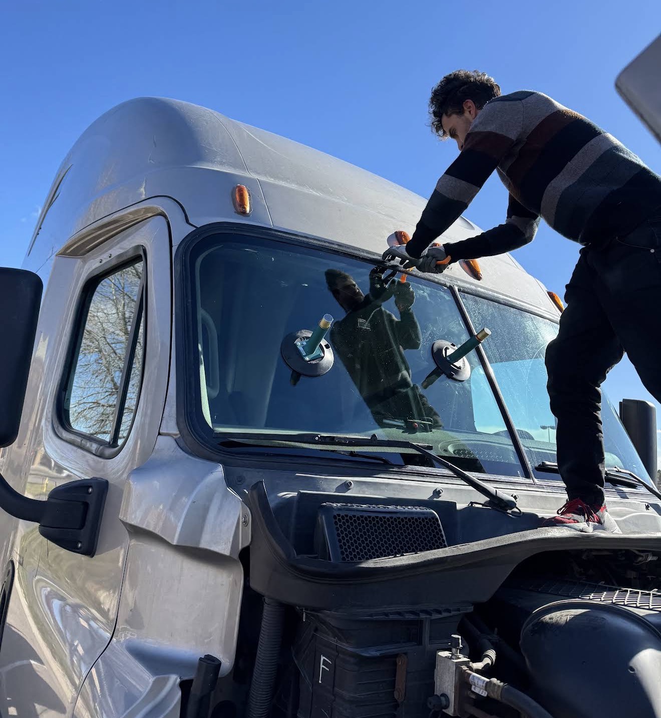 city auto glass commercial truck windshield replacement suction cups technician outdoor englewood co