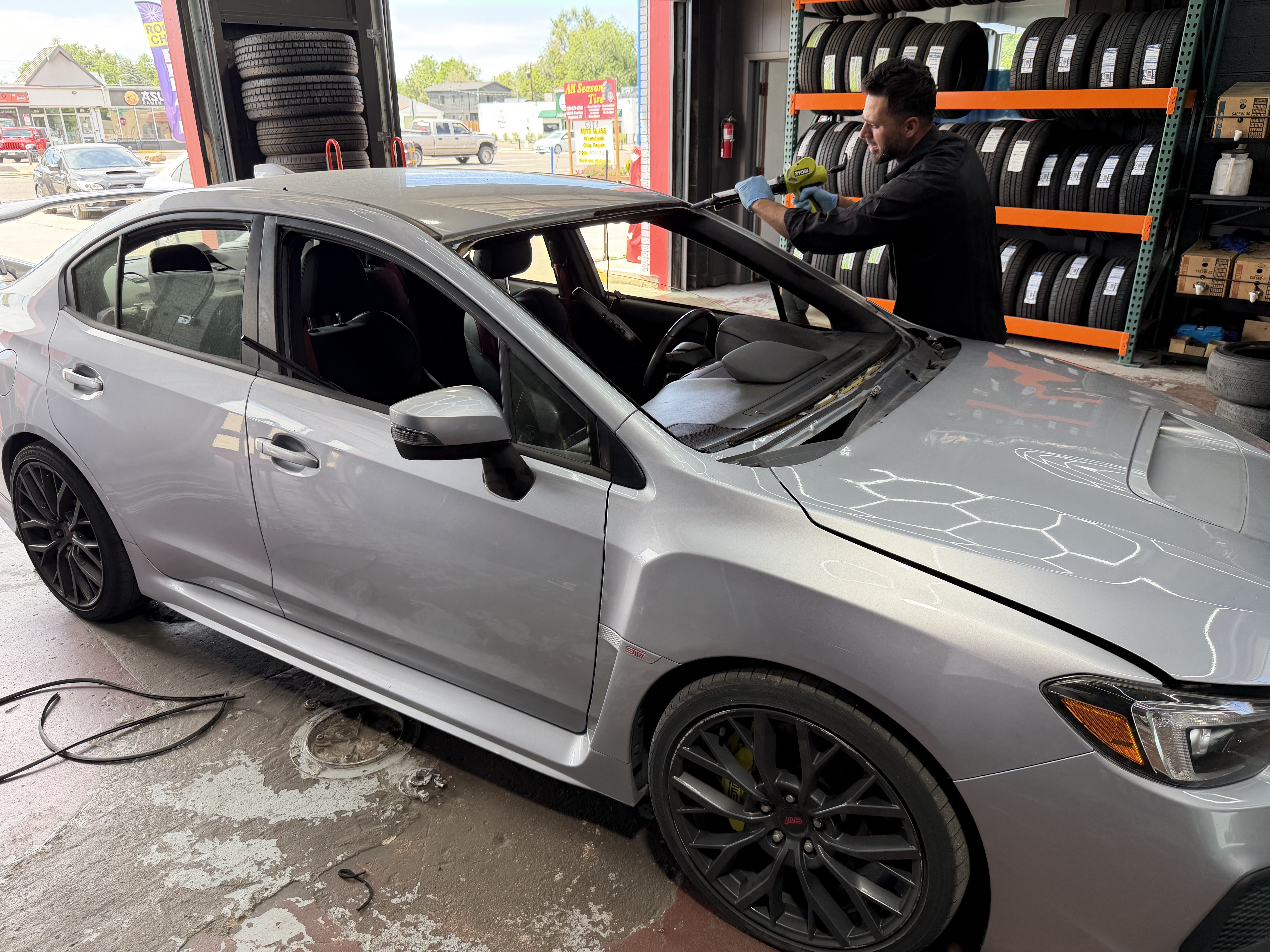 windshield removal subaru wrx sti silver technician power tool englewood co 14