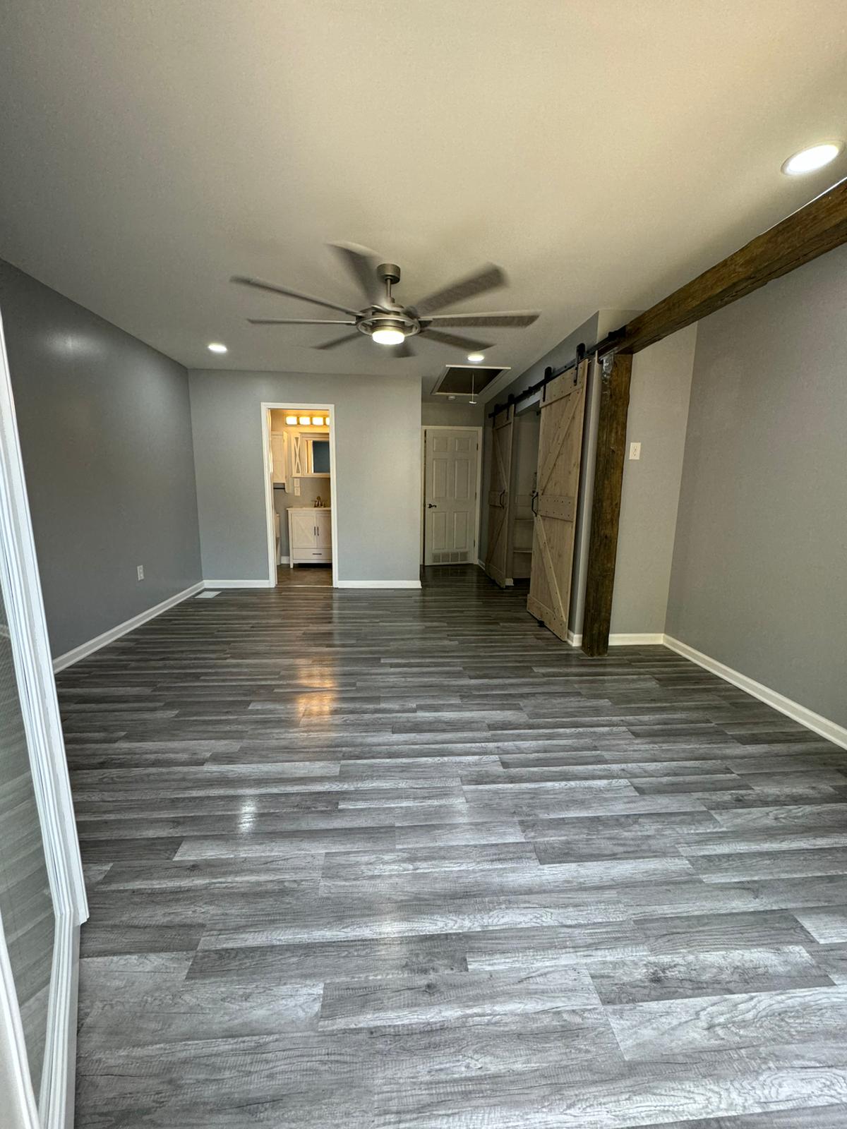 Luxury vinyl plank flooring installation completed by A Kingdom Construction Company in Louisville KY