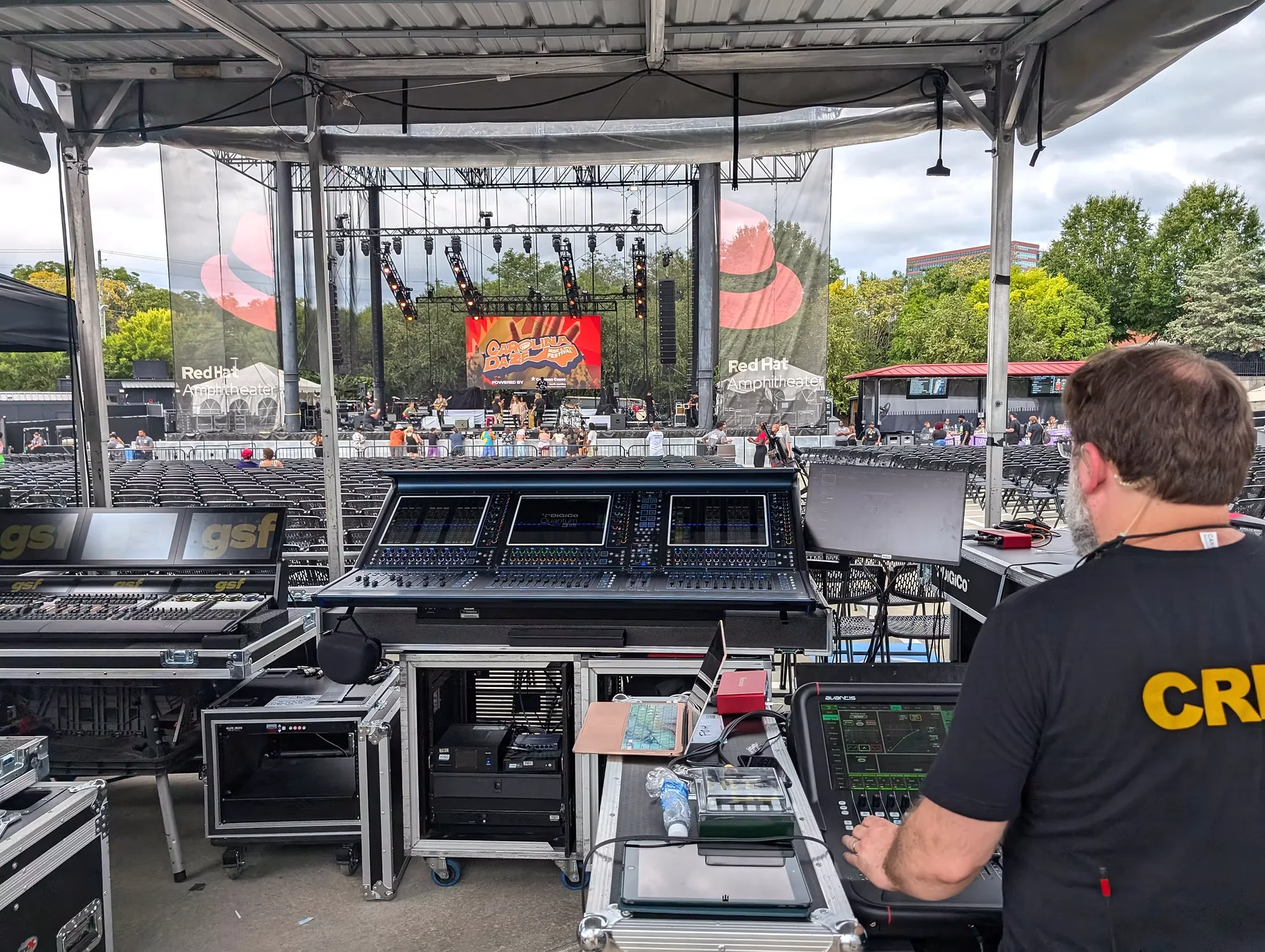 Professional line-array speakers on stage truss