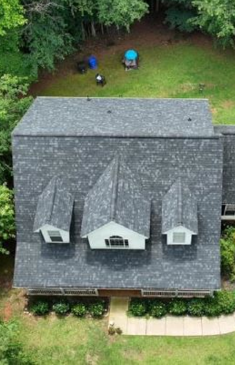 Dormer-style roof with asphalt shingles in Fayetteville, GA installed by Elite Roofing & Outdoor Construction — expert residential roof installation