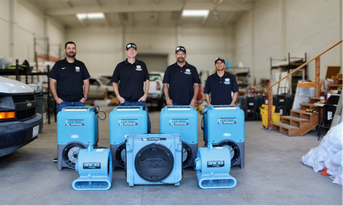 SunCoast Restoration team with professional drying equipment
