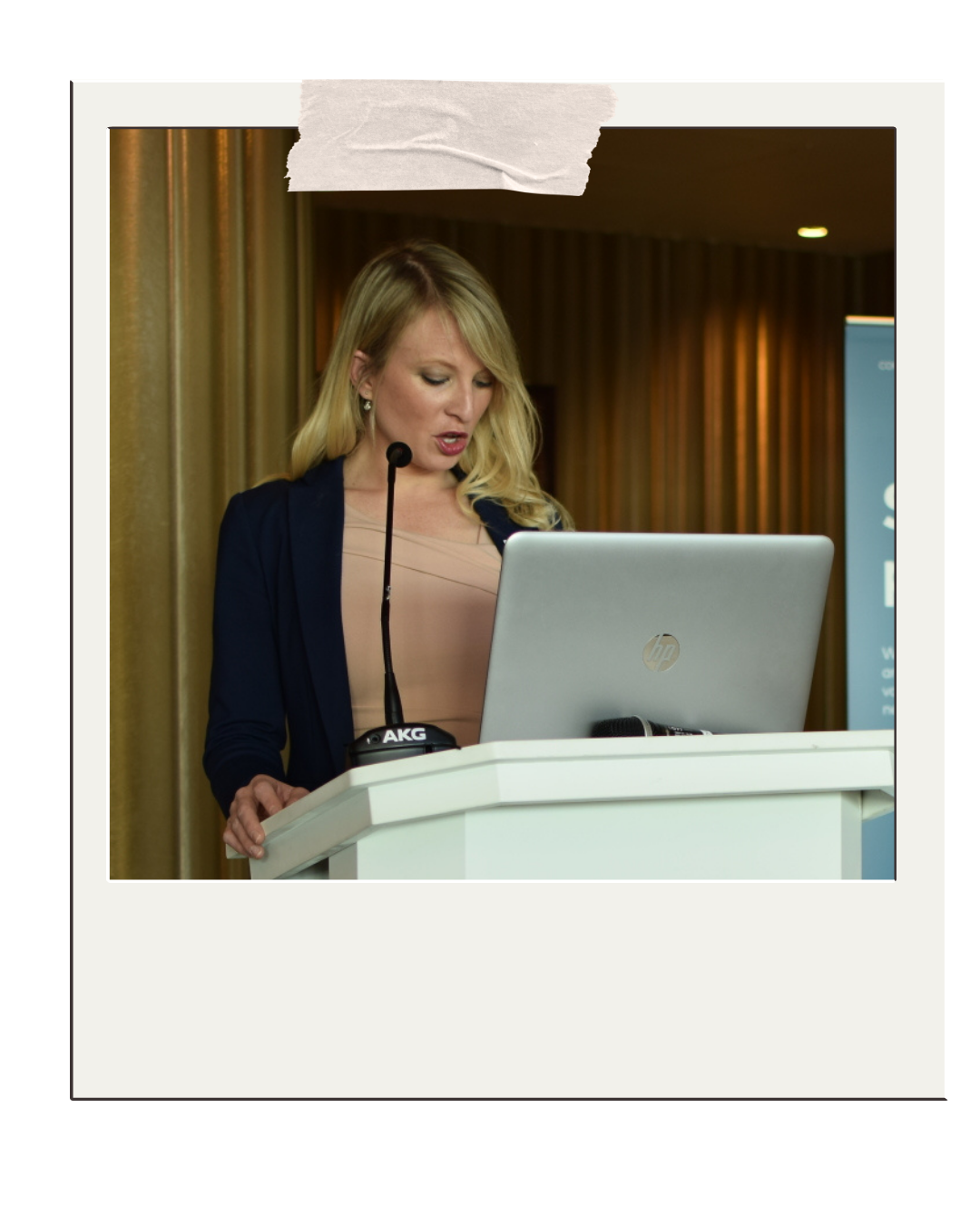 Kristin Morris speaking at a podium