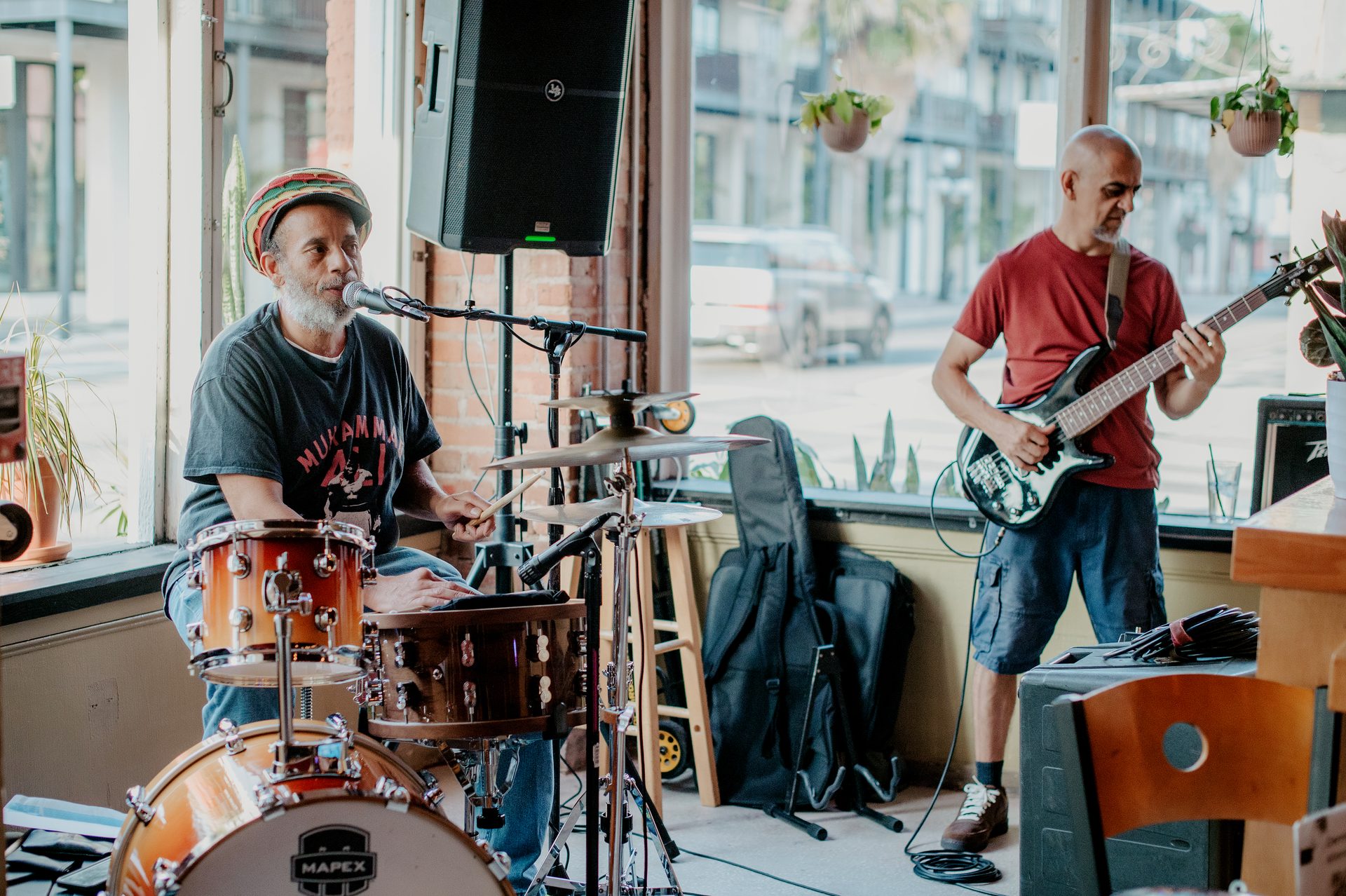 Live band playing by the front windows at The Bricks