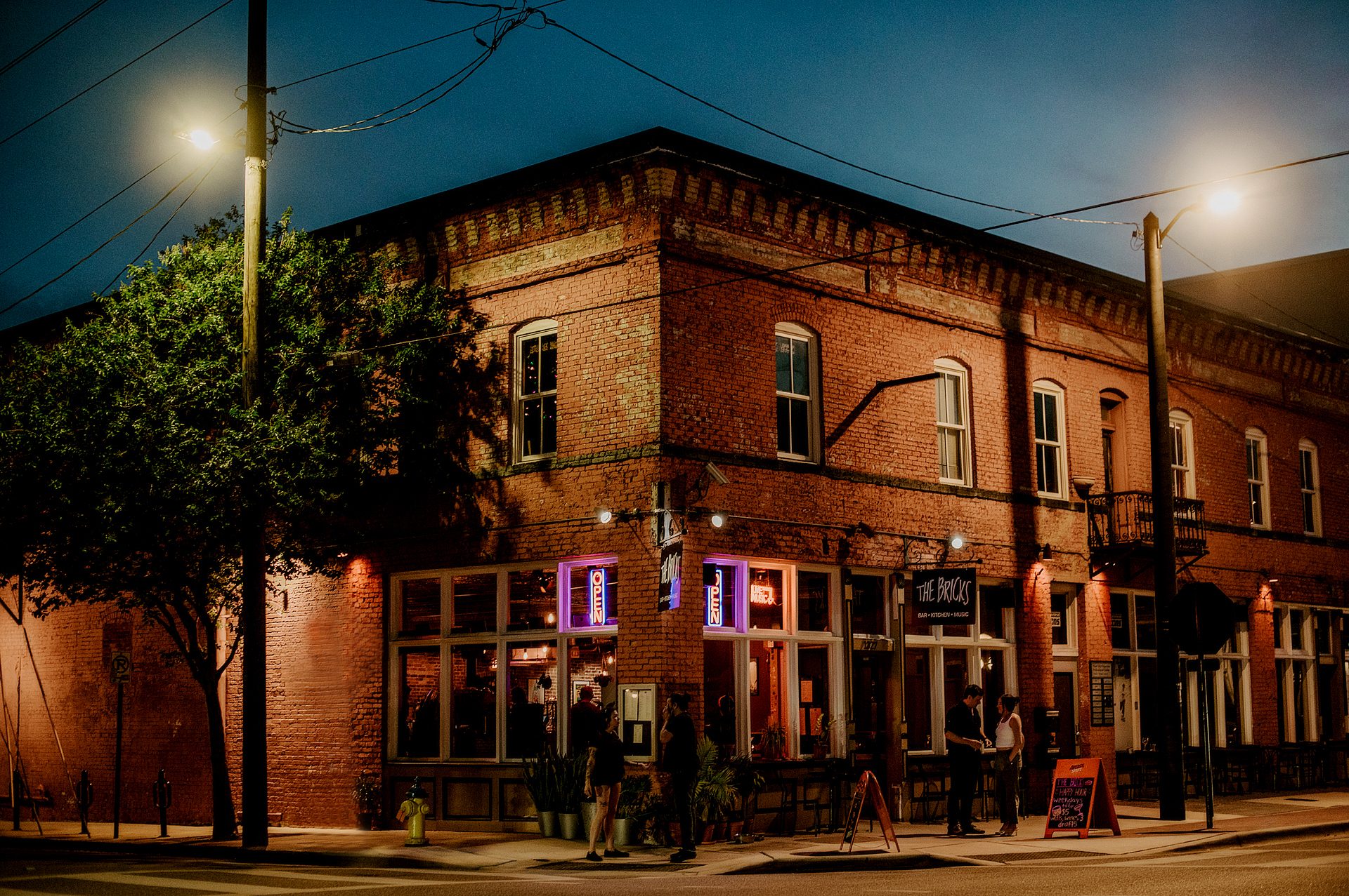 The Bricks bar with tin ceilings, exposed brick and Edison bulbs