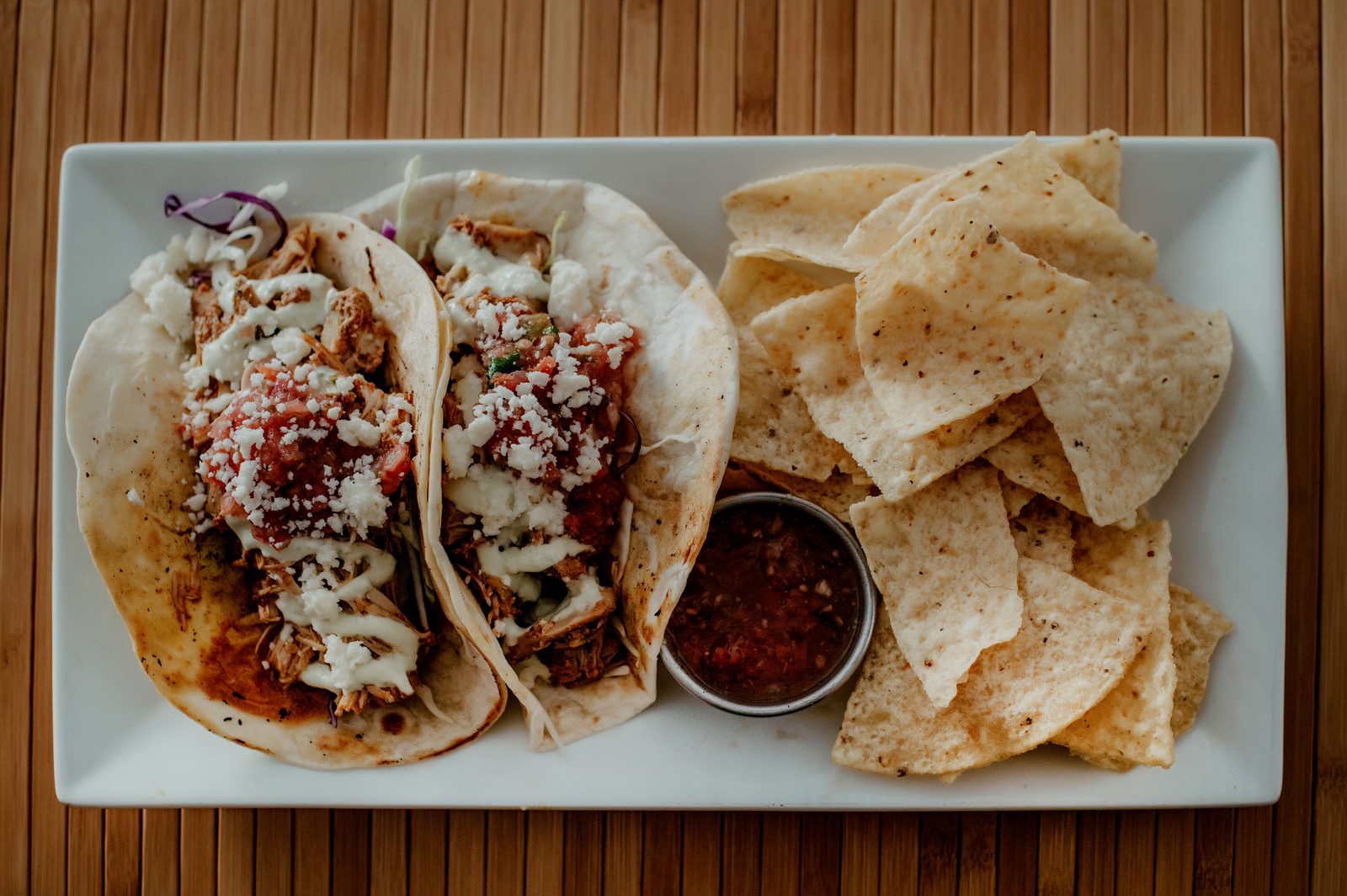 Tacos with chips and salsa at The Bricks