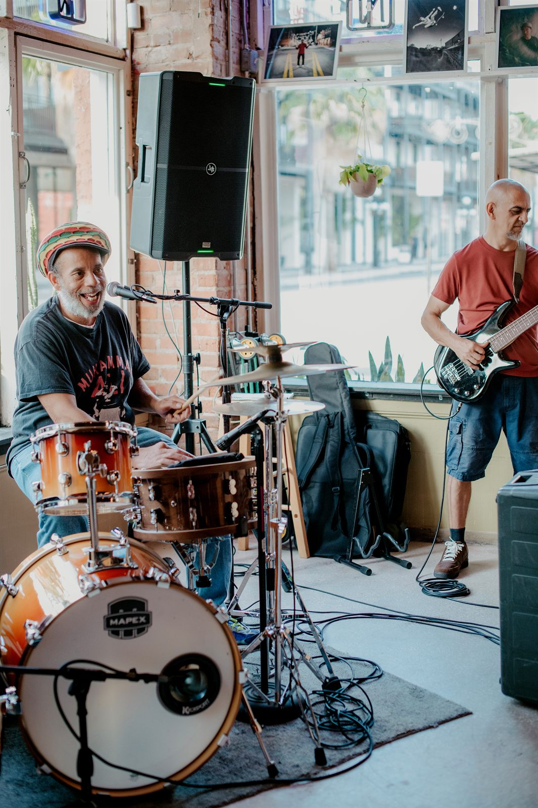Live band playing in the front window of The Bricks