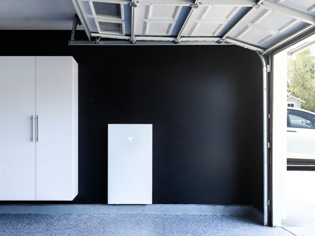 Whole home backup battery system installed in a garage in Utah County, Utah, for reliable power storage