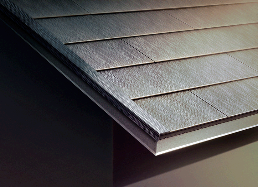 Close-up detail of textured Tesla Solar Roof tiles along the roof edge