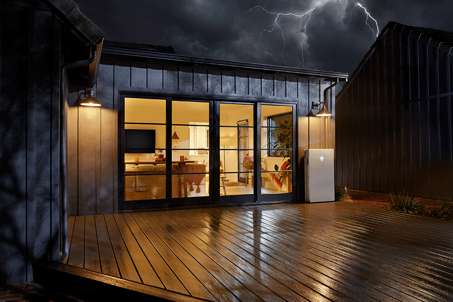 Tesla Powerwall 3 backup during a storm with home security and power protection