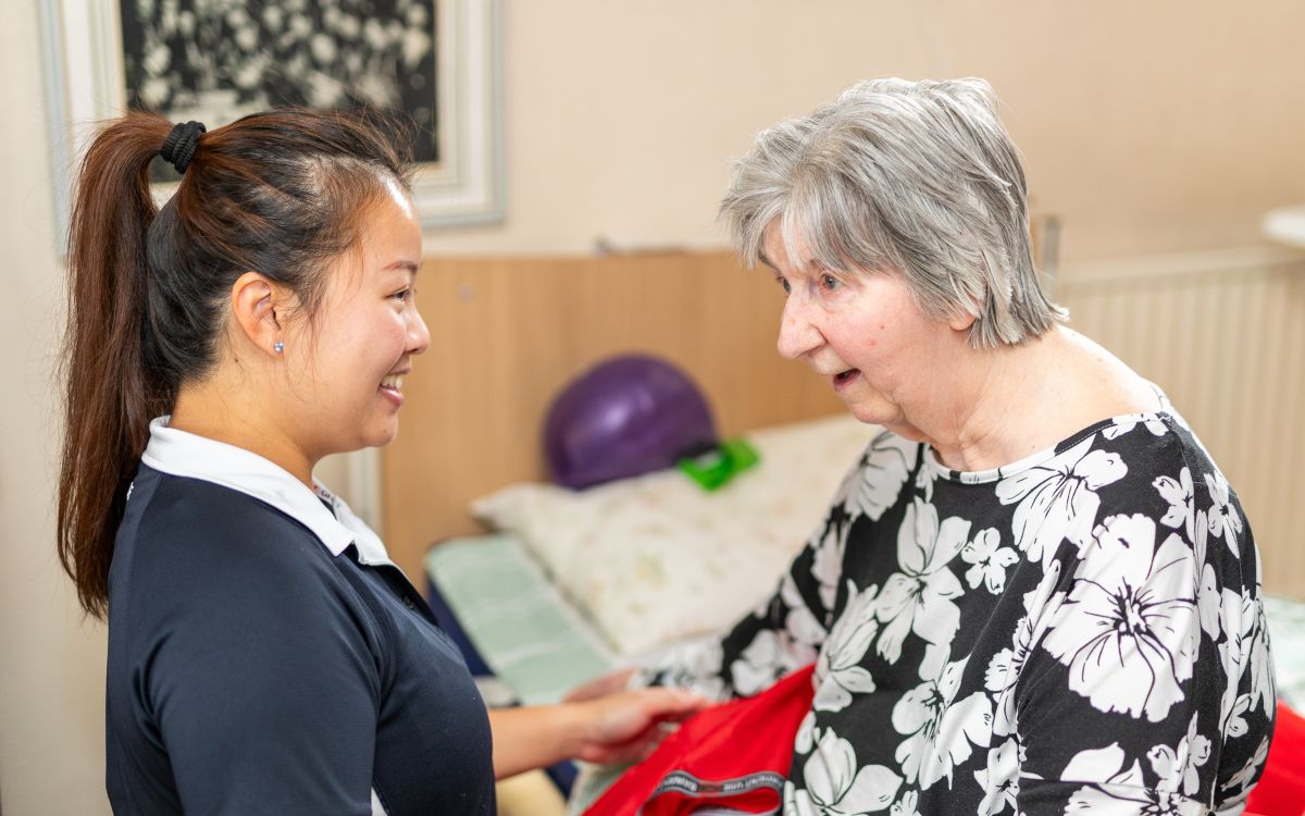 Physiotherapist meeting a care home manager
