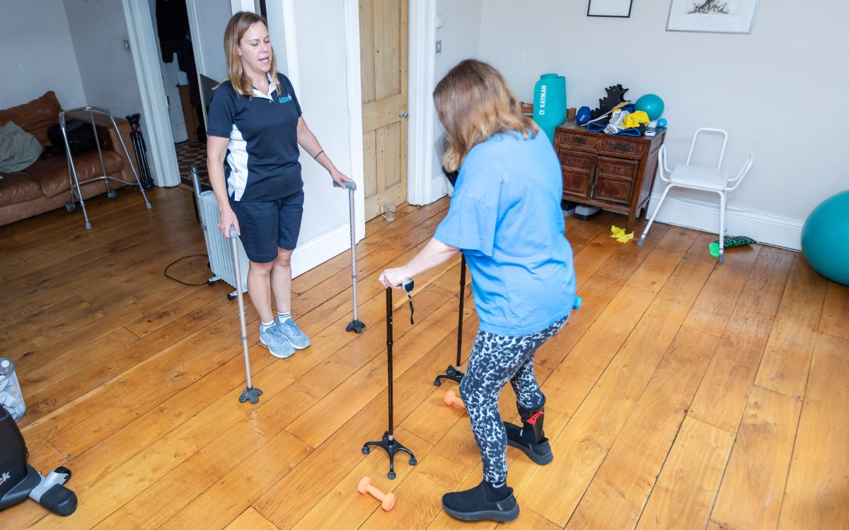 Home Links physiotherapist treating a client at home