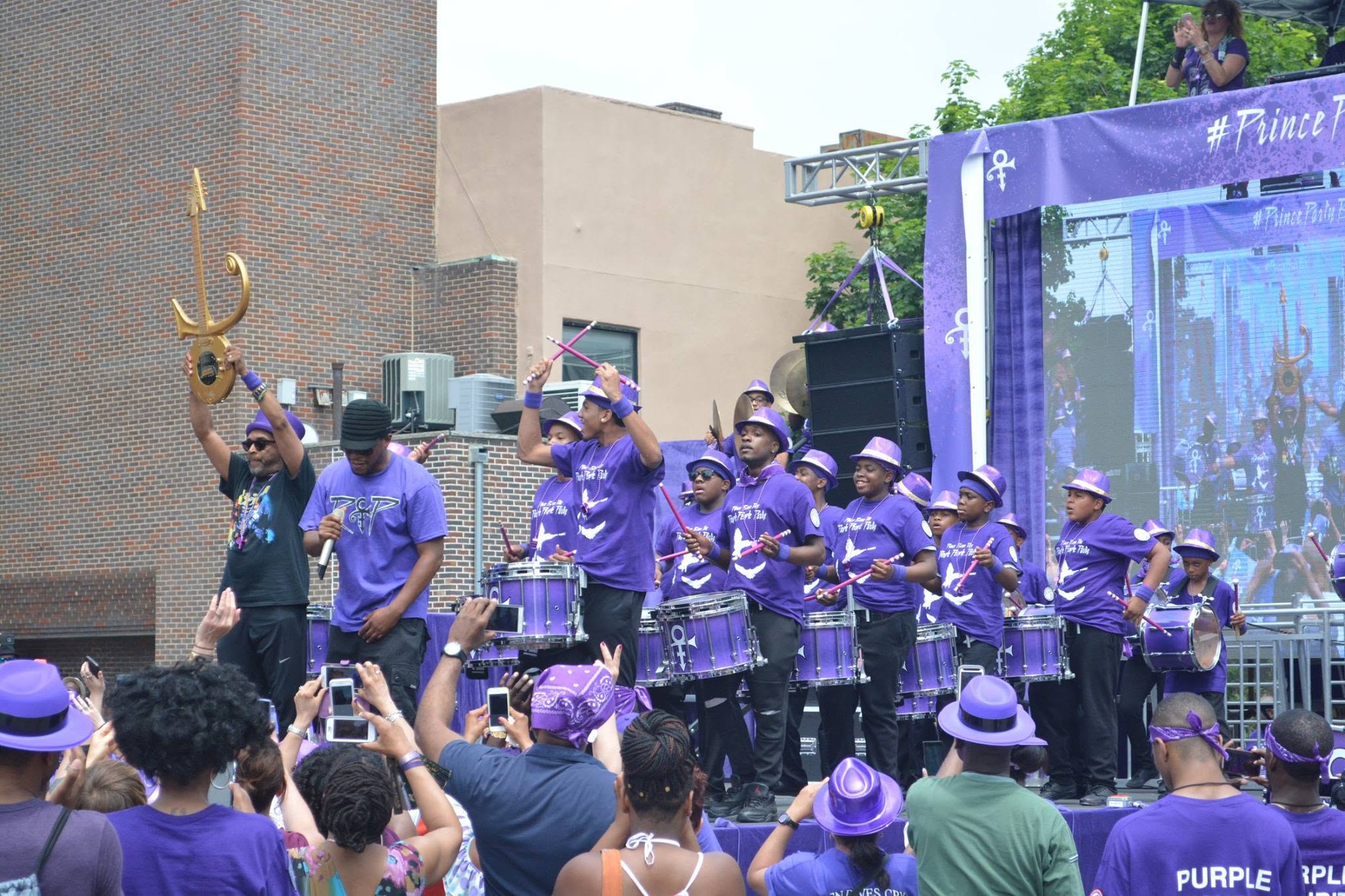 Group photo of BK Steppers students and teaching artists on stage