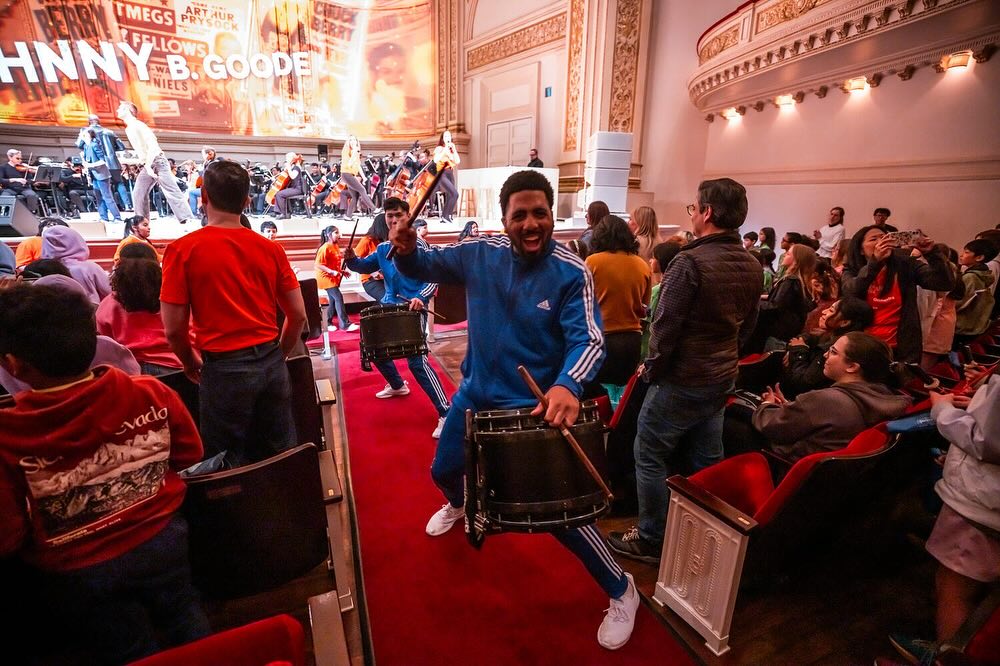 Young BK Steppers students performing at a historic venue