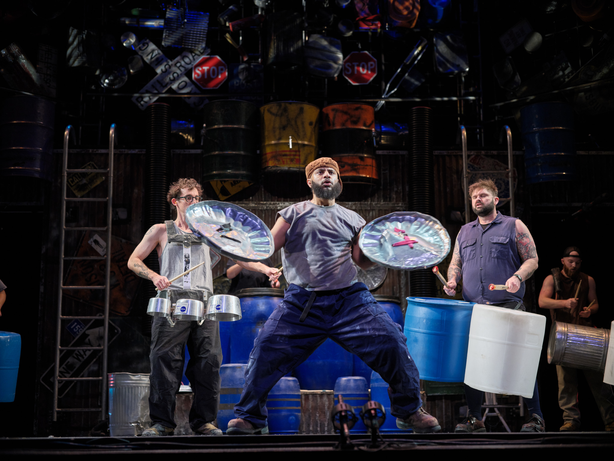 Michael Mendoza performing with STOMP on tour