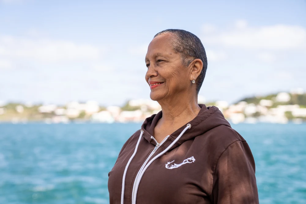 Amatullah, INTO Bermuda driver, looking out over the harbour