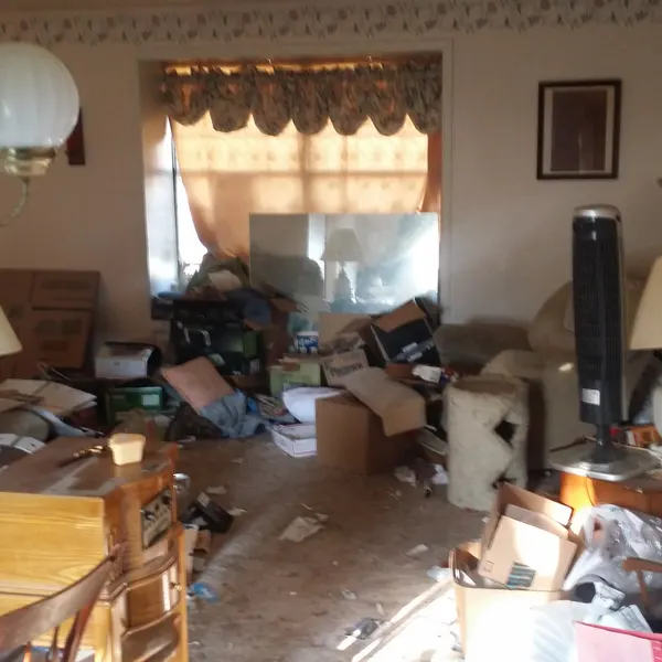 Home before — cluttered and dated, bought as-is