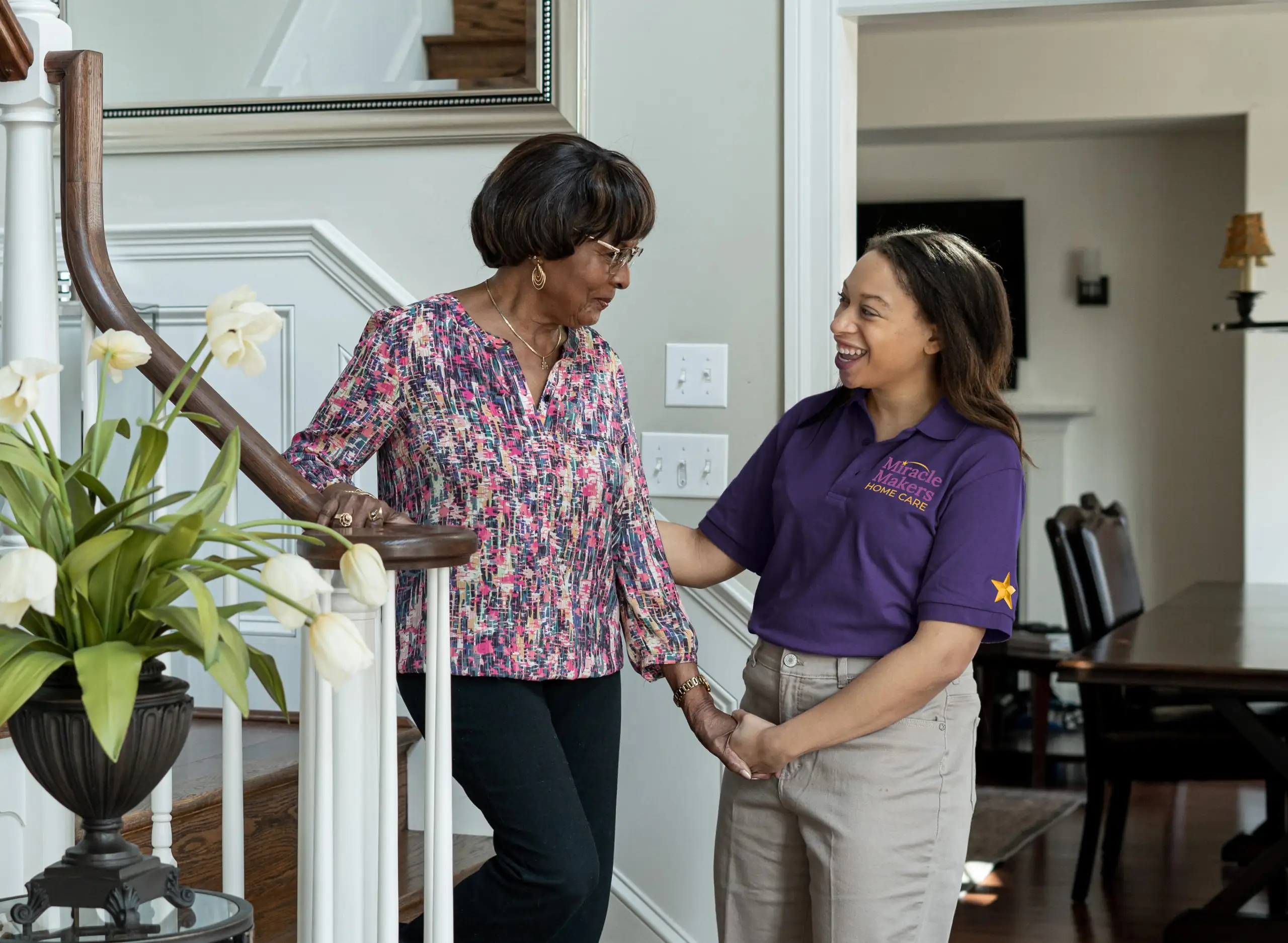 Live-in caregiver assisting a senior throughout the day at home