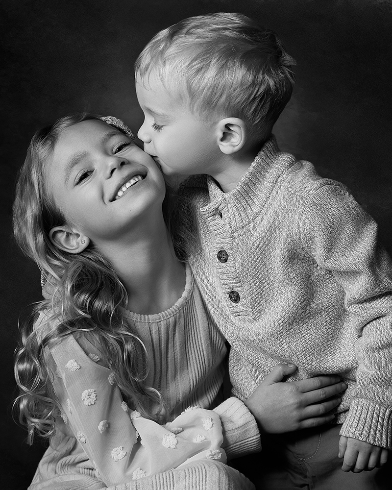 Fine art family portrait of brother and sister in Vancouver studio