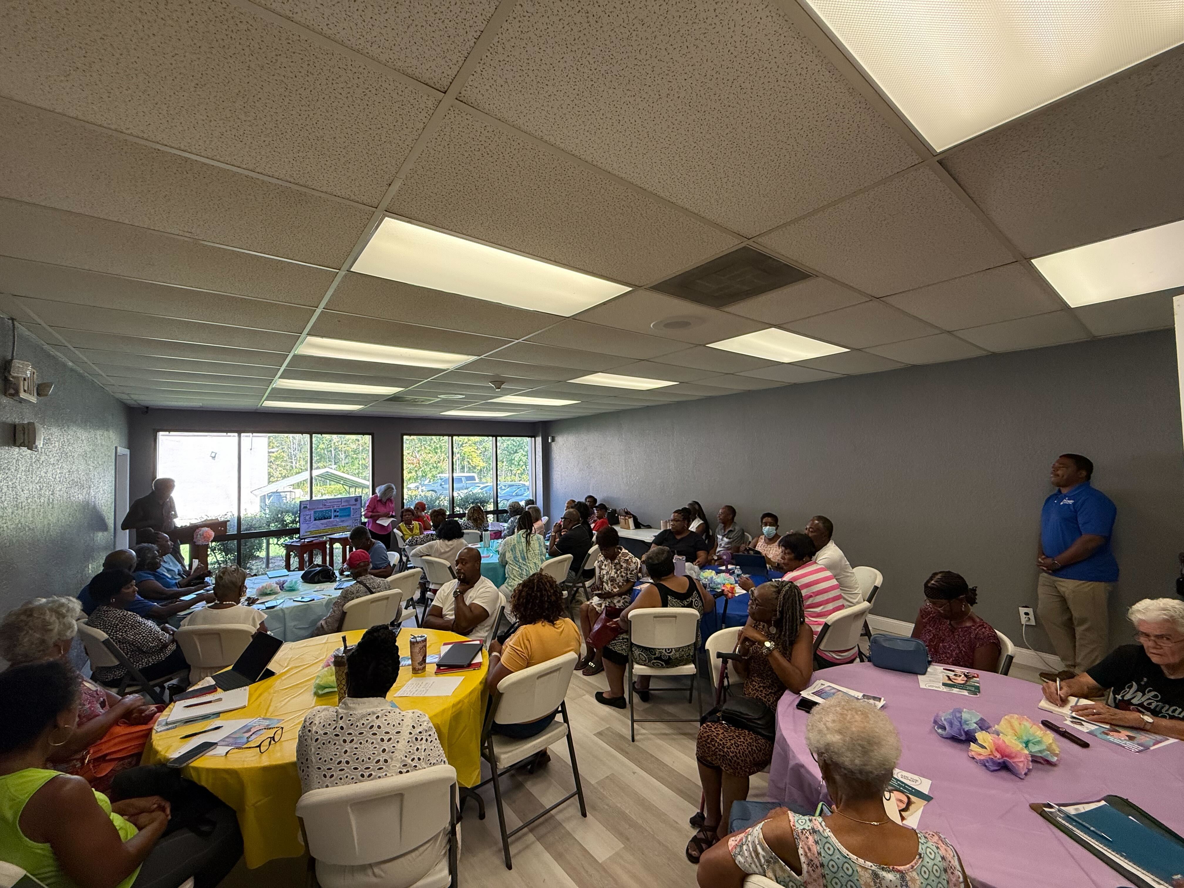 Florida senior speaking with a licensed Medicare advisor from Mere Benefits