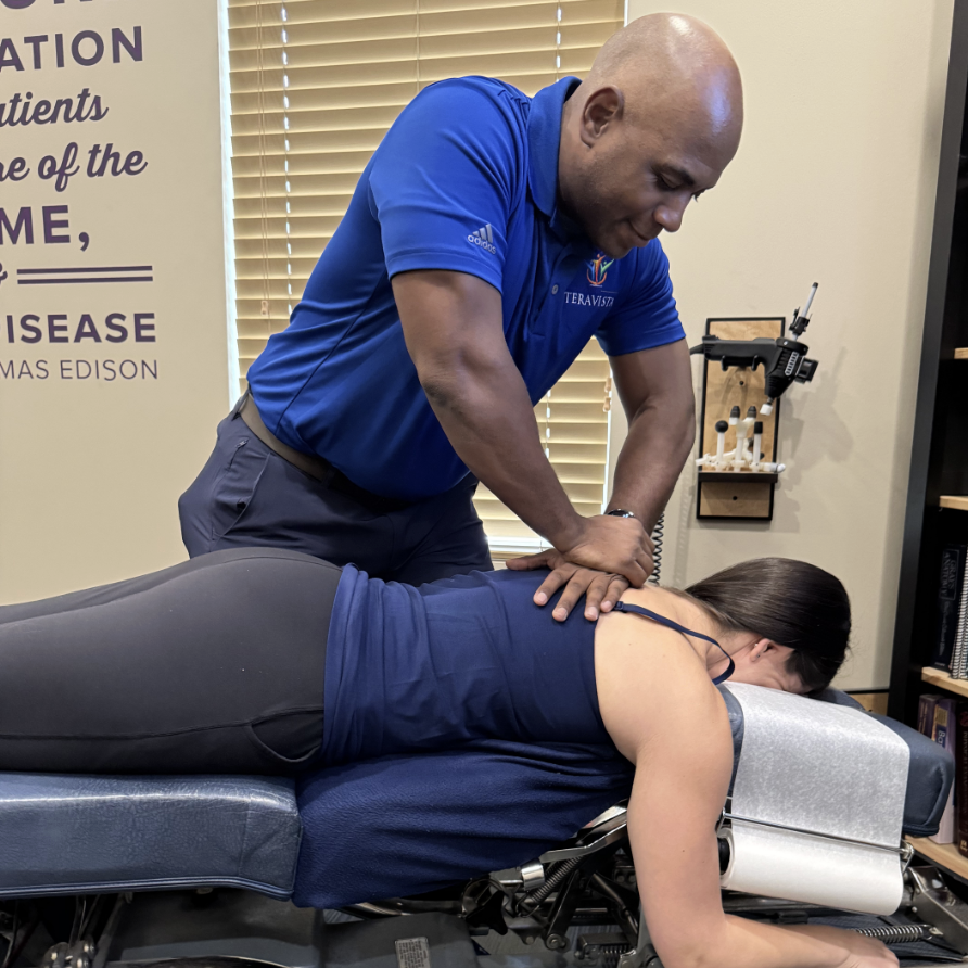 Dr. Harris treating a patient at Family Chiropractic at Teravista