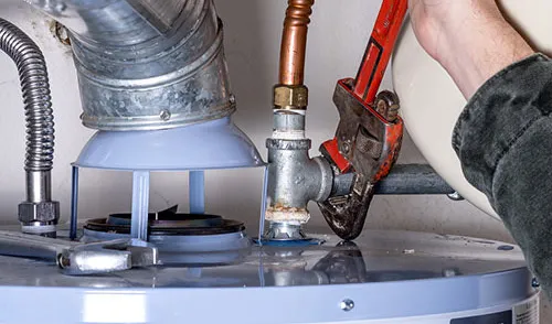 Water heater repair service fixing residential hot water tank in Coachella Valley