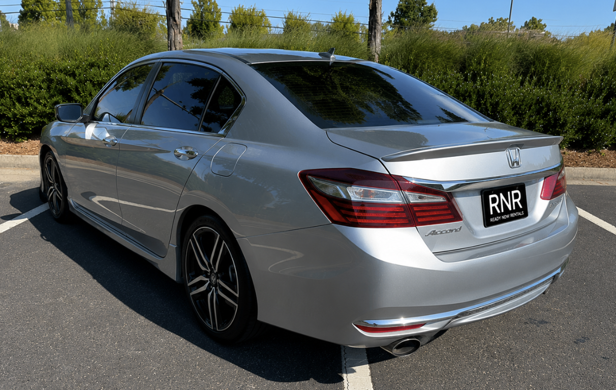 Silver Honda Accord Sport, rear three-quarter view