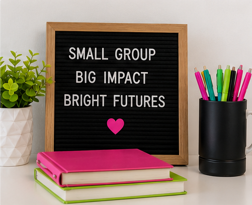 Letter board displaying "Small Group, Big Impact, Bright Futures" with educational supplies representing Joy's Educational Services' teaching philosophy.