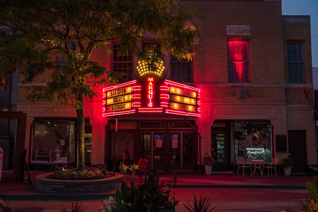 Current photo of the Marquis Theater in Northville, MI, with a Marquis sign and brick facade.