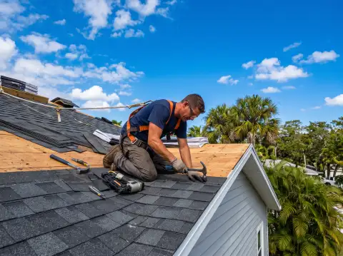 Roofing professional at work