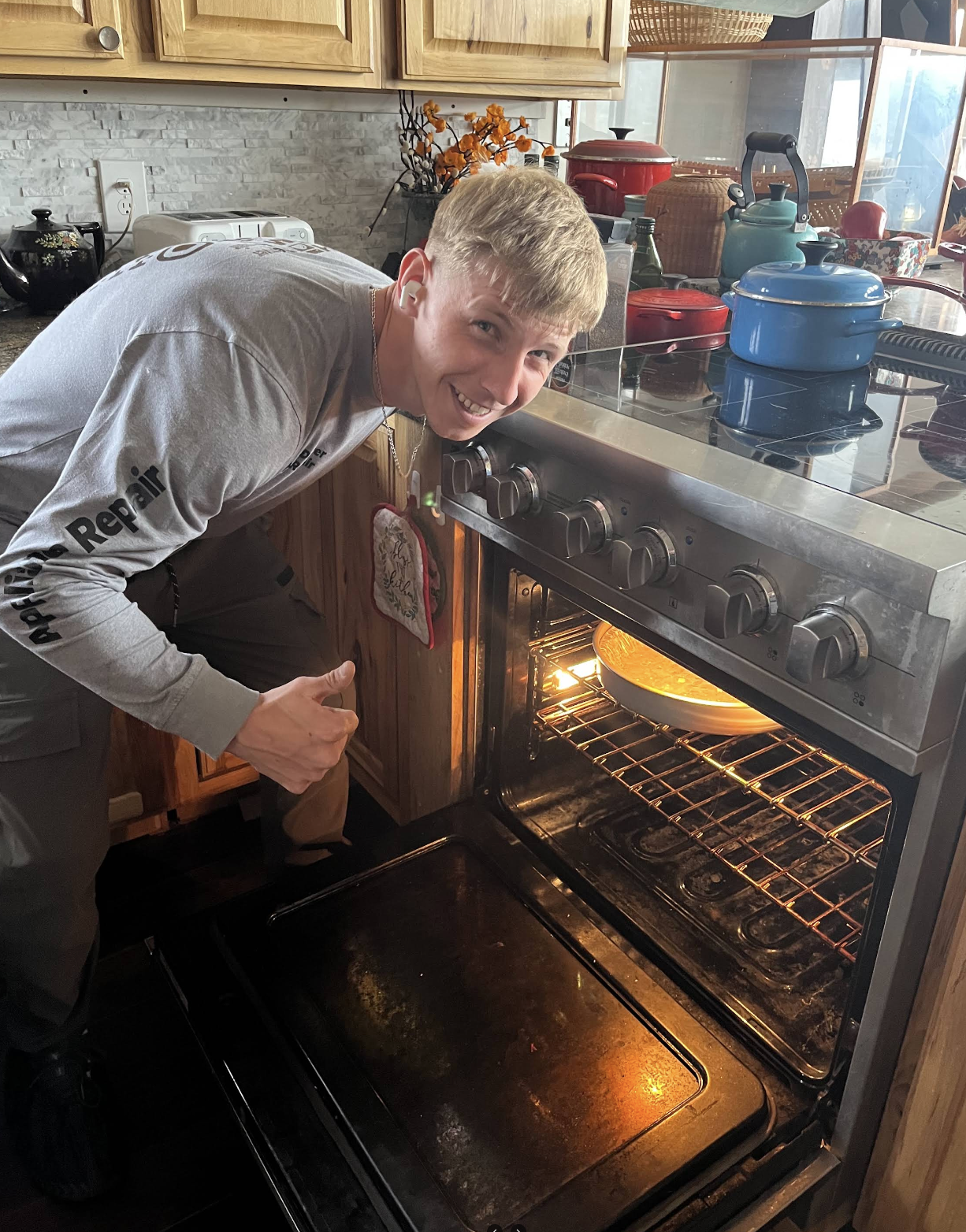 Gena opening an oven for diagnosis — Denver metro