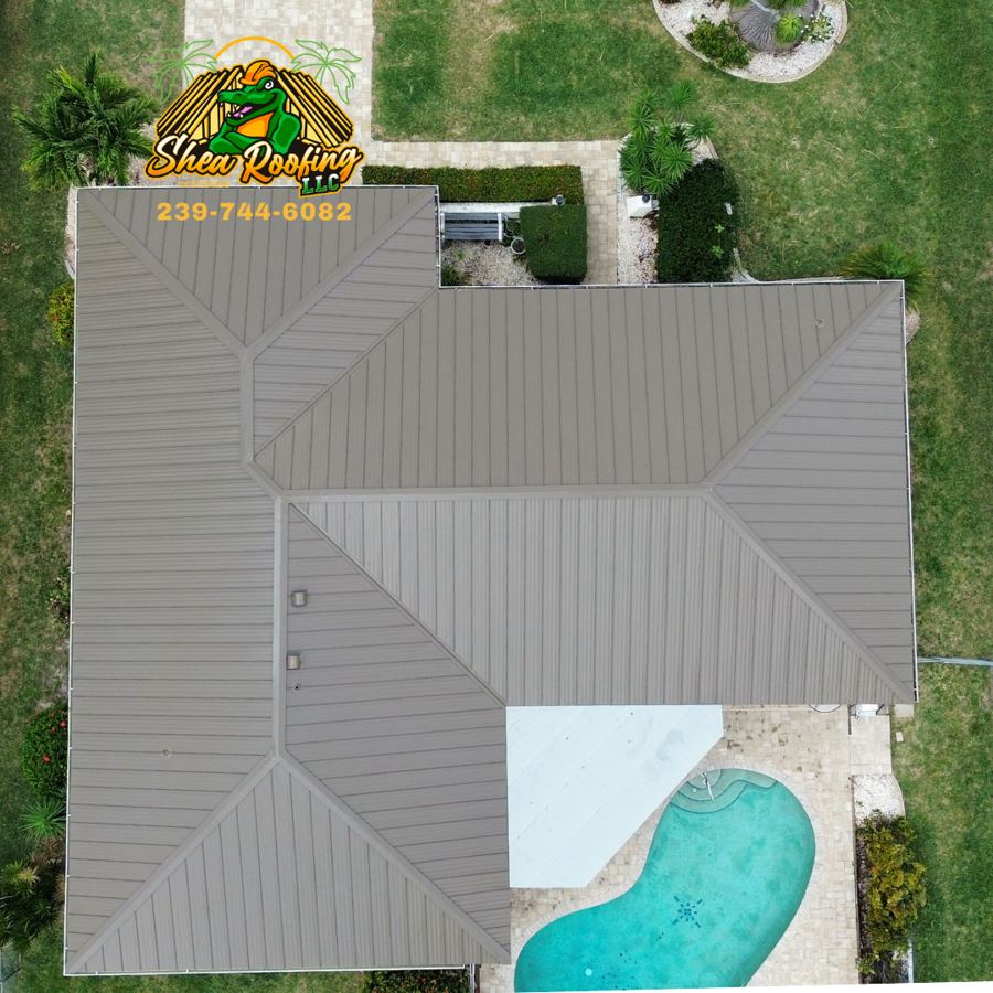 Top-down view of a metal roof and pool