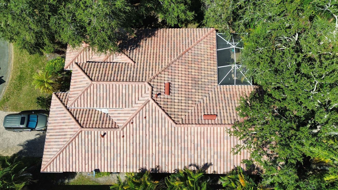 Aerial view of a finished clay barrel tile roof on a Punta Gorda Isles home