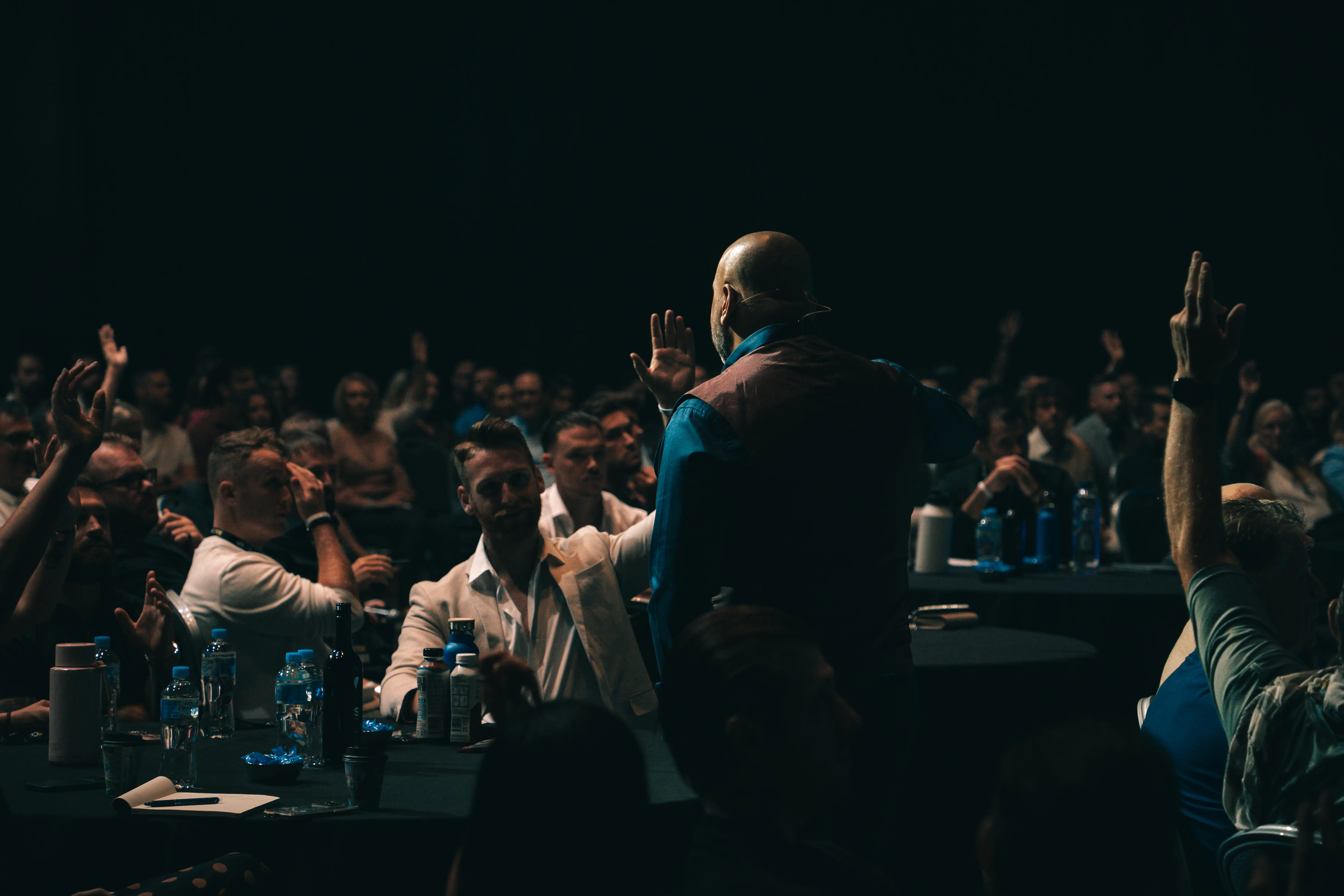 Audience view showing the scale and energy of a sales conference