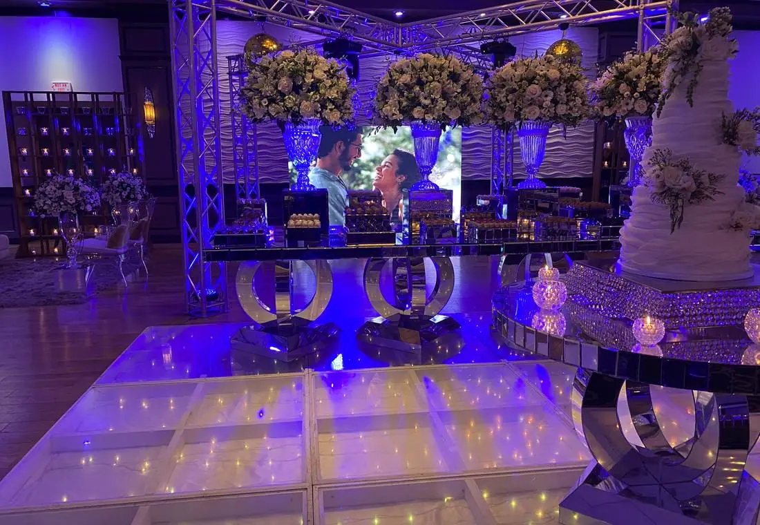 Ballroom transformed with purple and blue uplighting