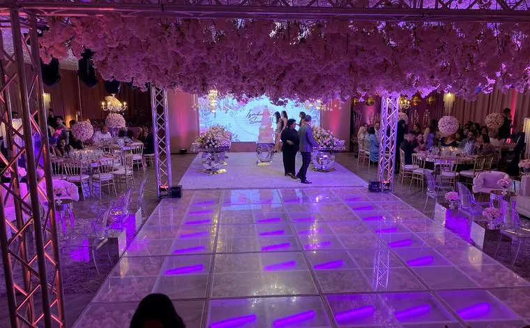 Ballroom with truss structure and coloured lighting over the dance floor