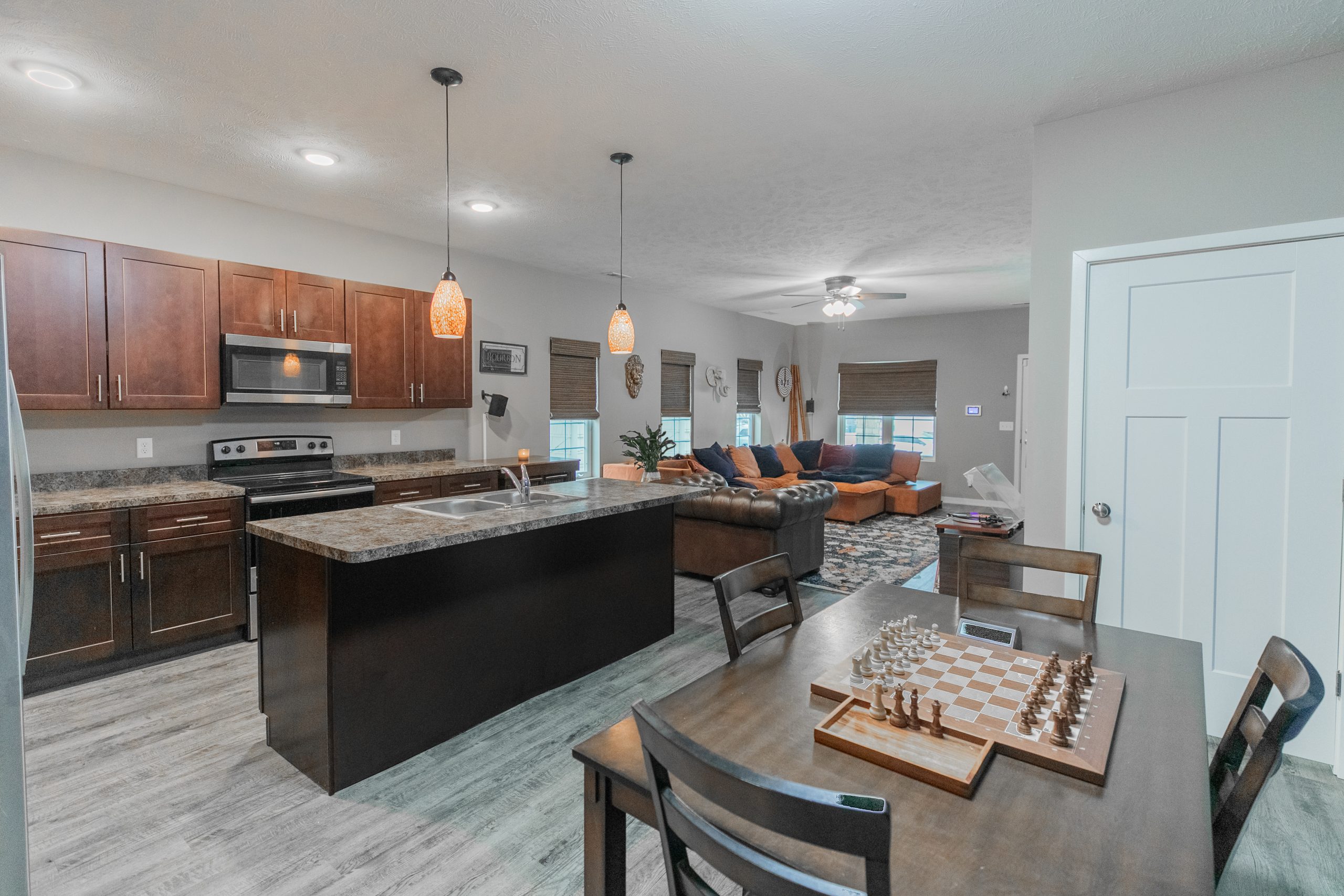 Kitchen with stainless steel appliances and granite counters