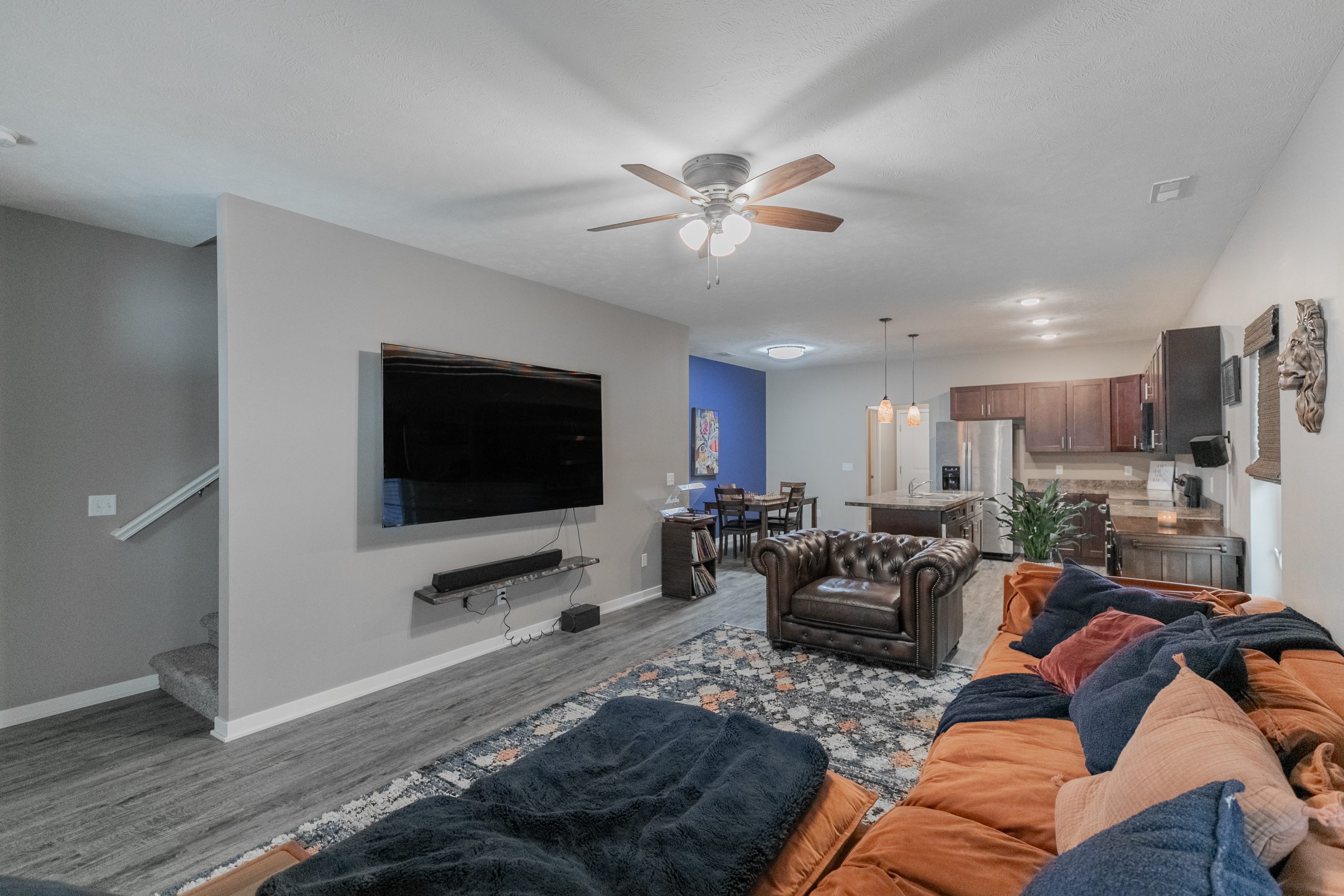 Kitchen with island, pendant lighting, and dining area