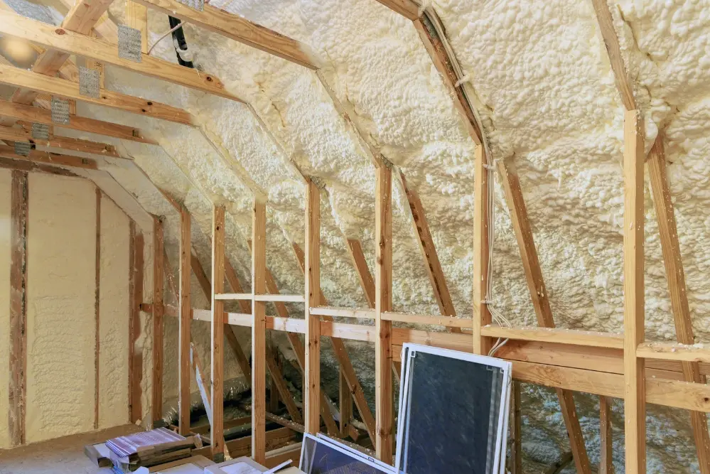 Open-cell spray foam applied in attic walls to reduce noise transfer by 903 Spray Foam in Sumner, TX