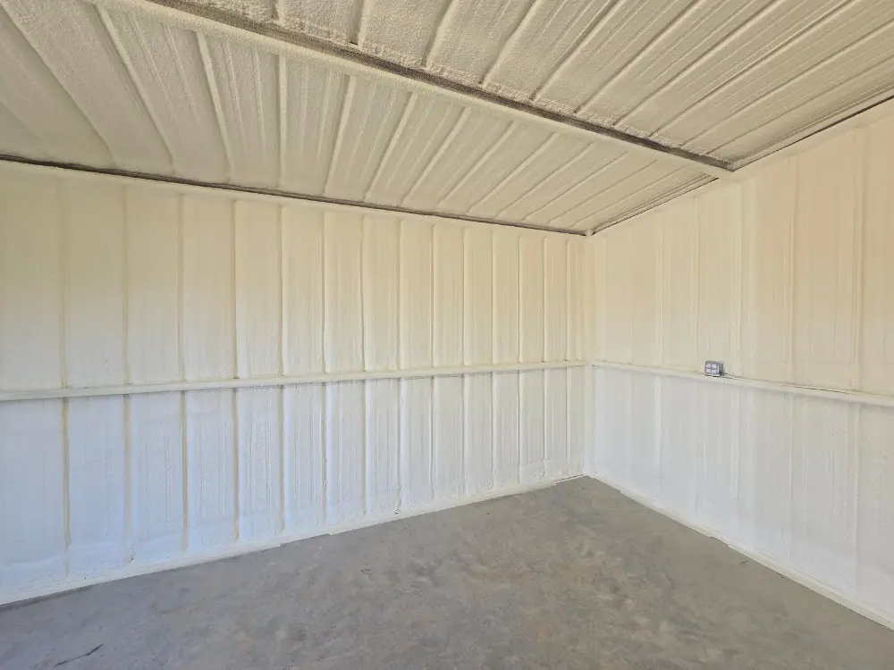 Closed-cell spray foam insulation applied to interior walls and ceiling by 903 Spray Foam in Commerce, TX