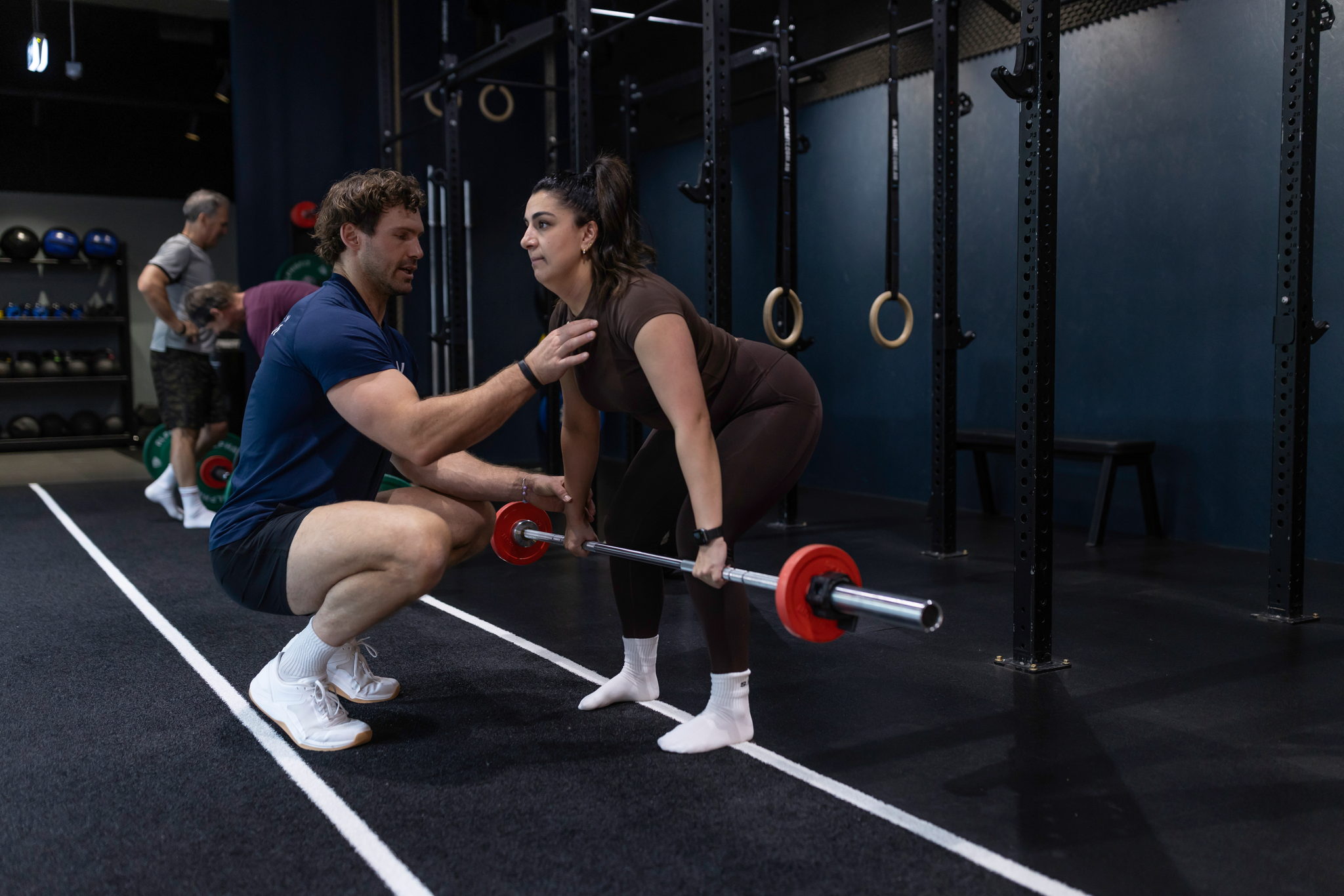 Coach and client training together on the KGS floor