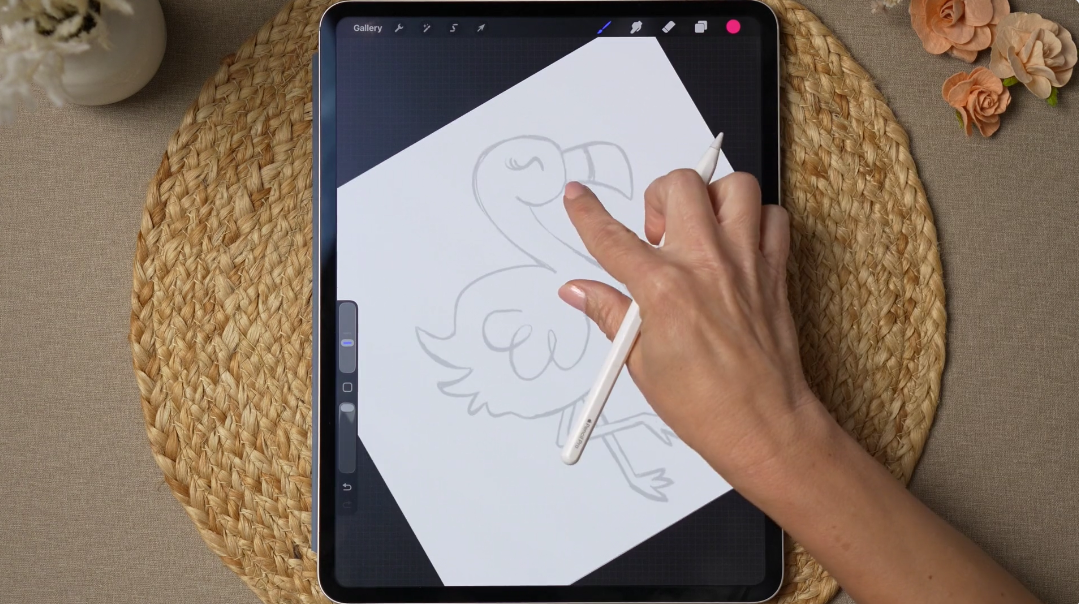 Sketching a flamingo from a traceable sketcher in Procreate