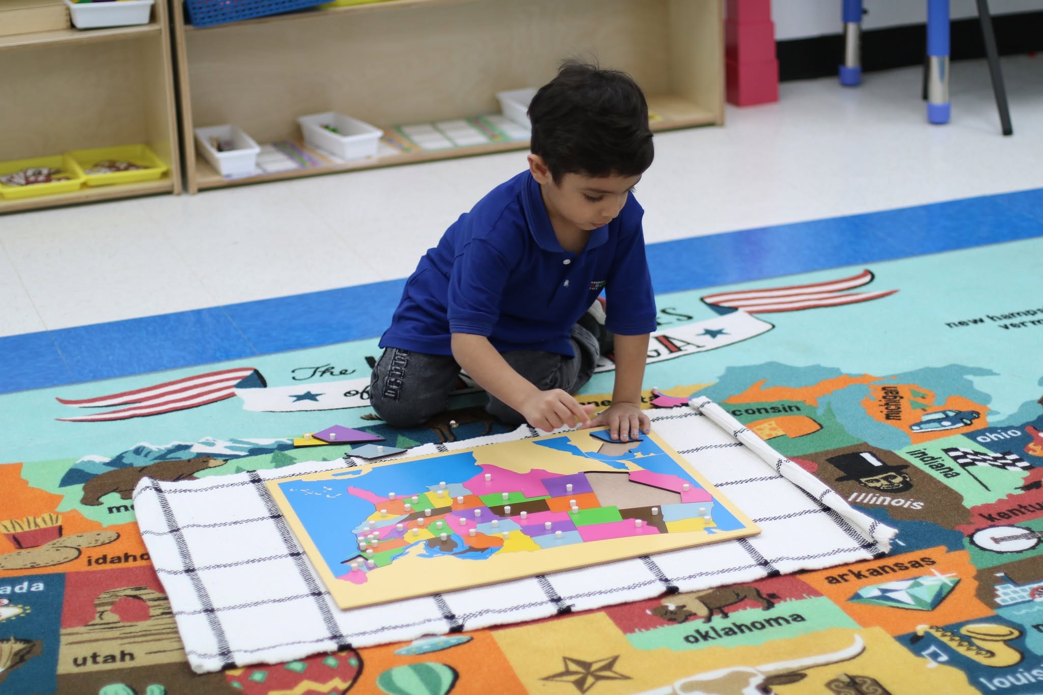 Kingsbridge Montessori children exploring learning materials, activity 1