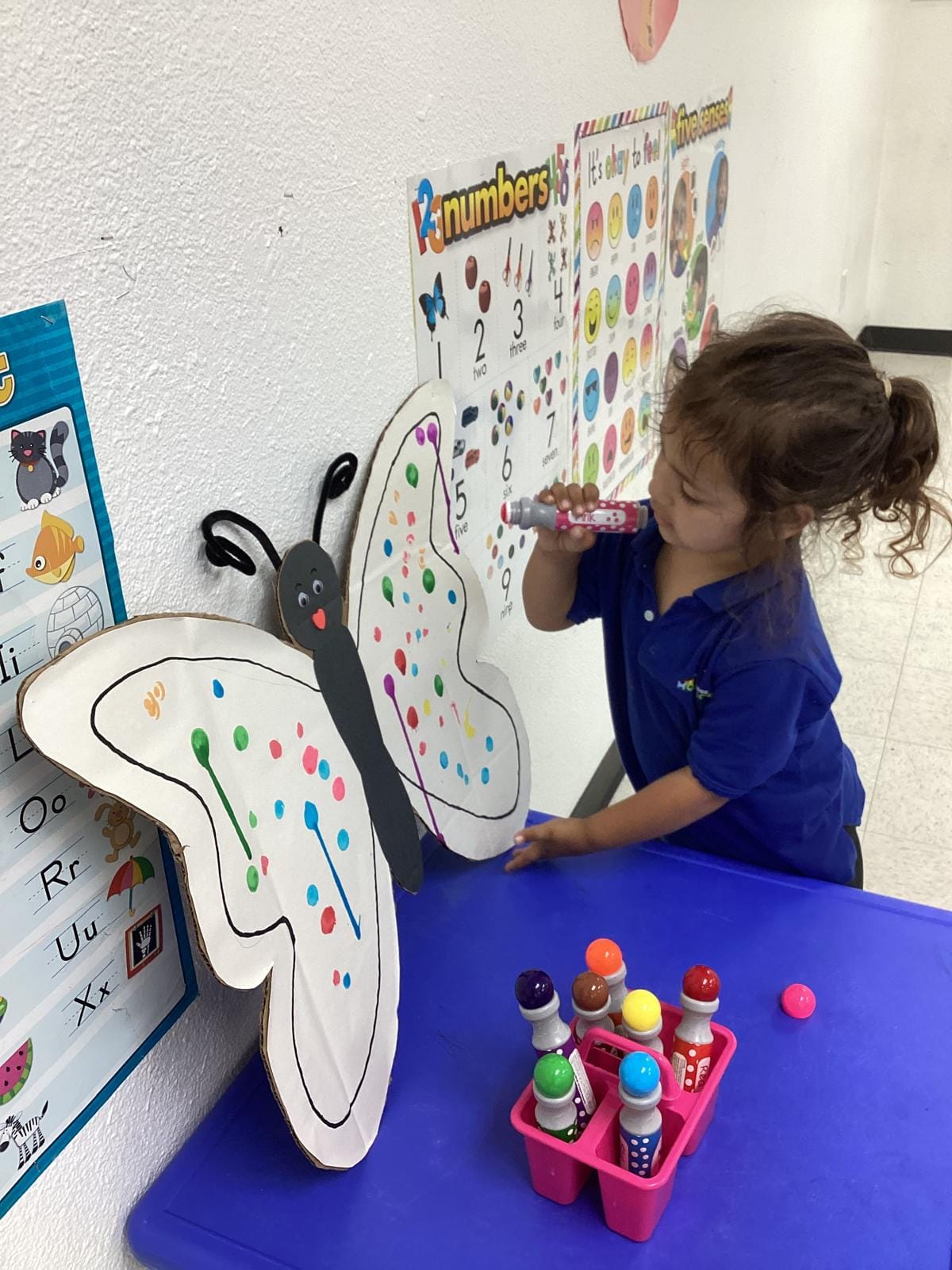 Kingsbridge Montessori children exploring learning materials, activity 4